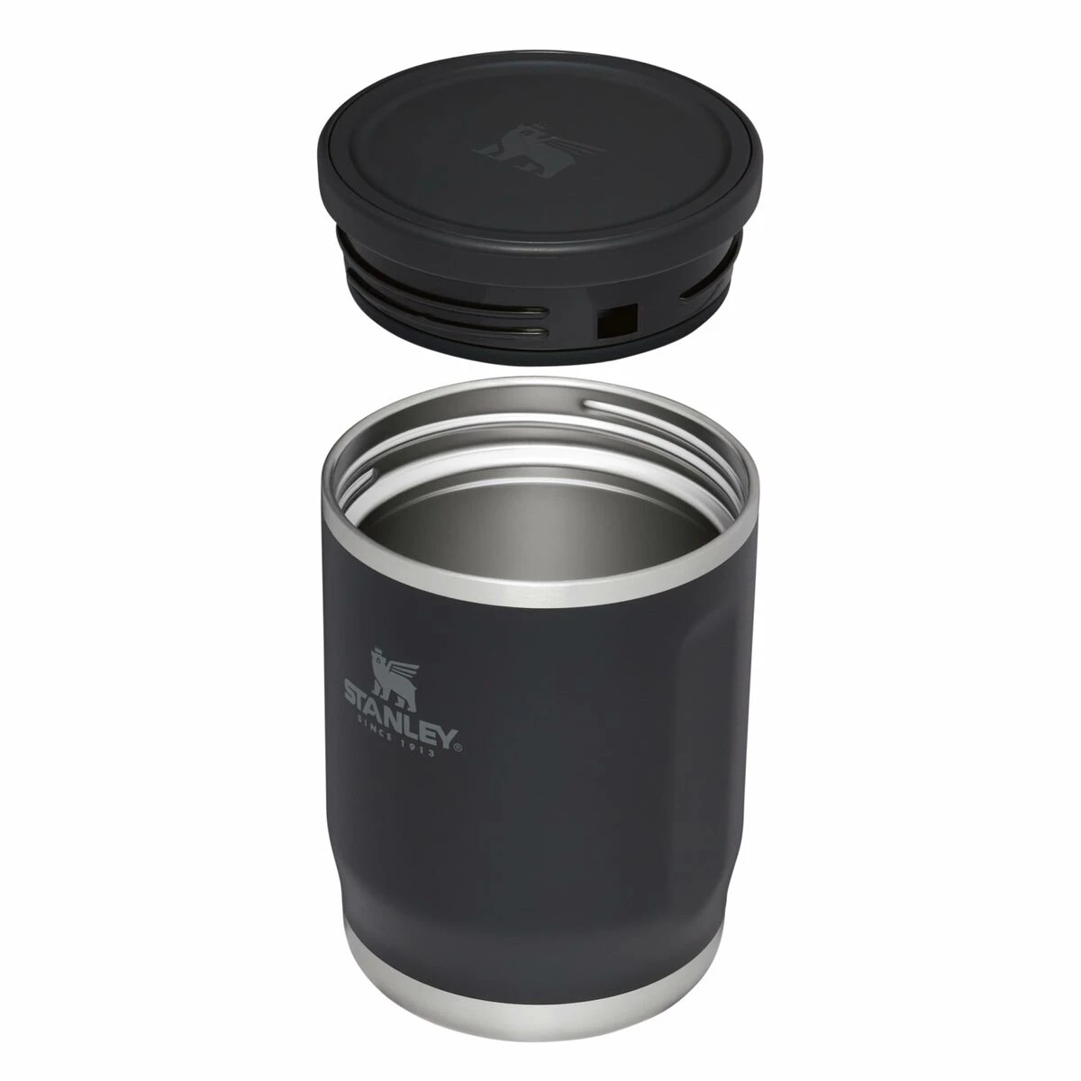 Stanley insulated tumbler with lid aside.