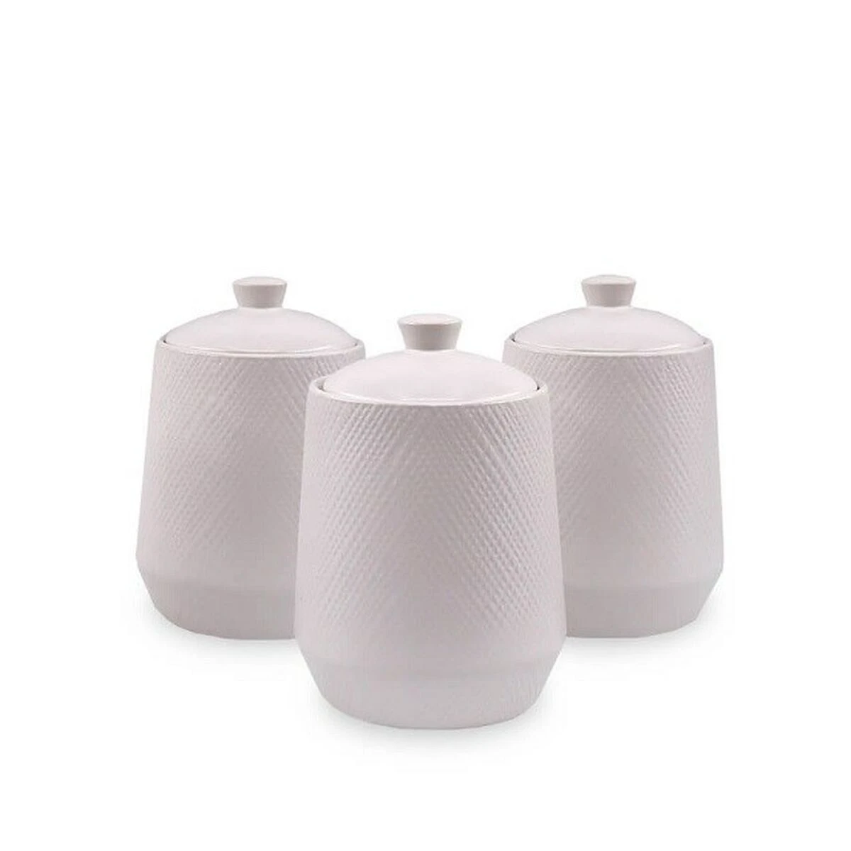3 textured white jars with lids on plain background.